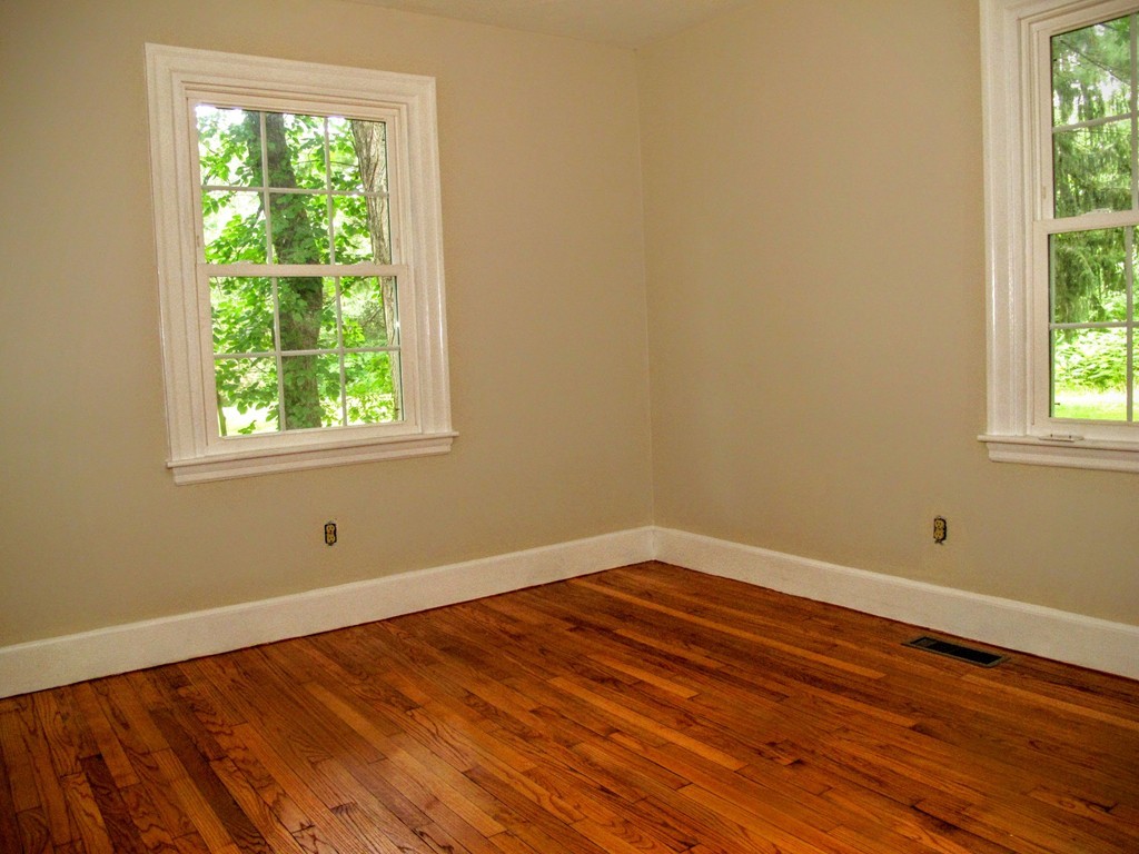 56 Plumtree Road Sunderland, MA 01375 - Photo 16 of 29 an empty room with wooden floor and windows