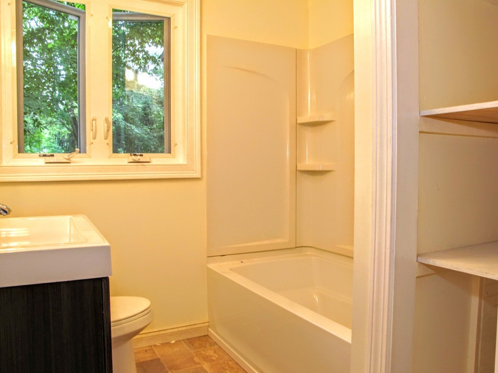 56 Plumtree Road Sunderland, MA 01375 - Photo 17 of 29 a bathroom with a bathtub sink and toilet
