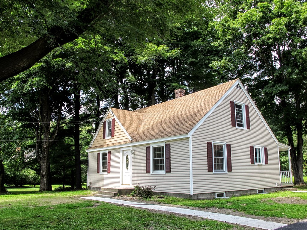 56 Plumtree Road Sunderland, MA 01375 - Photo 2 of 29 front view of a house and a yard