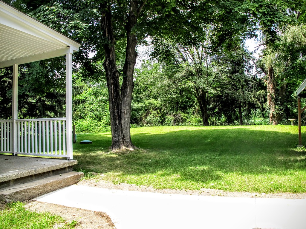 56 Plumtree Road Sunderland, MA 01375 - Photo 4 of 29 a view of a porch with a yard