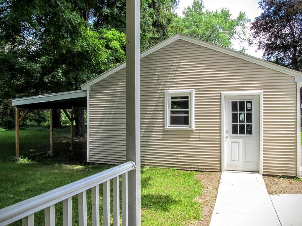 56 Plumtree Road Sunderland, MA 01375 - Photo 7 of 29 a view of a house with a yard