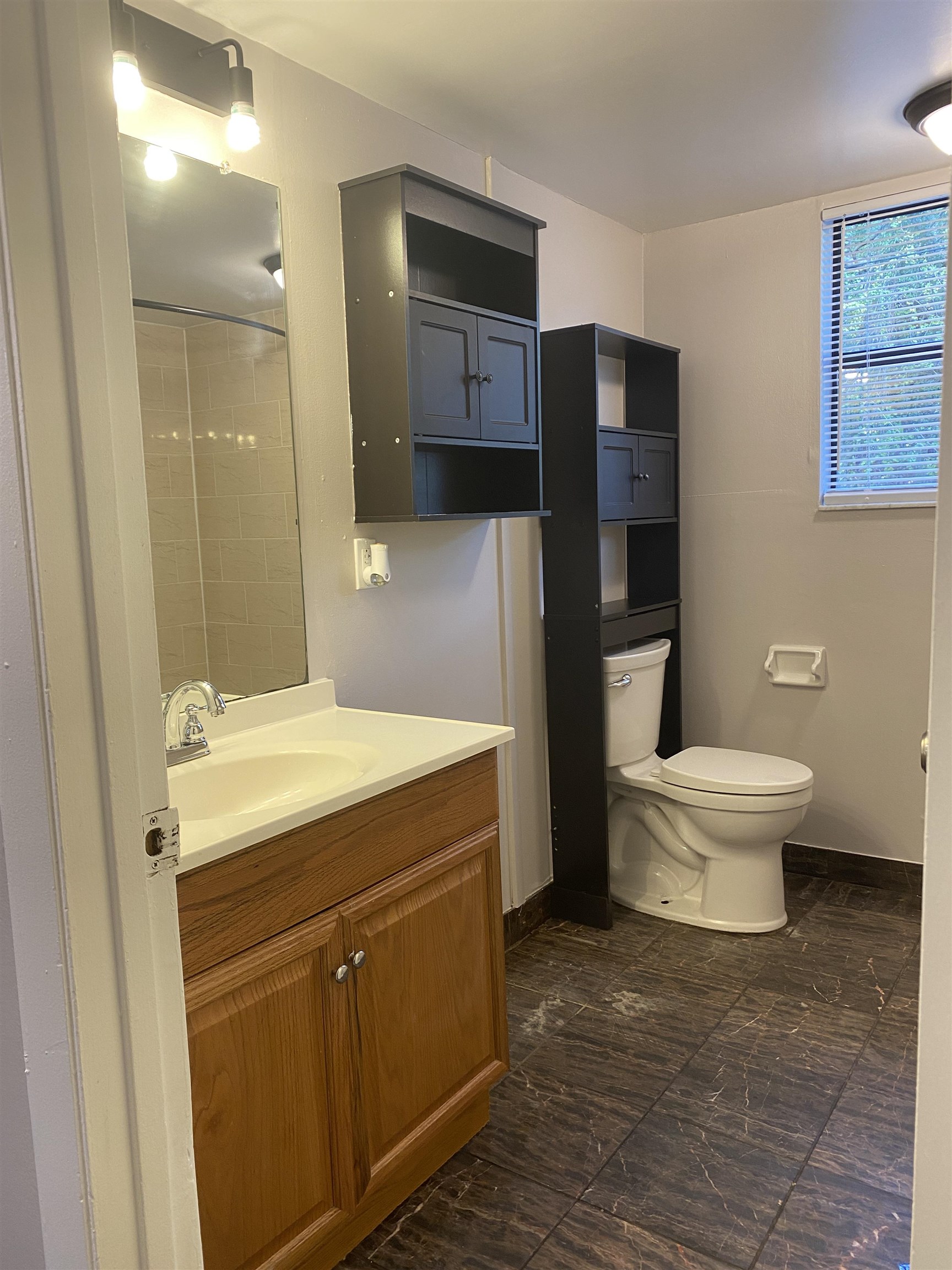 35 Atlantic Oaks Circle, Unit A St. Augustine Beach, FL 32080 - Photo 11 of 21 a bathroom with a sink toilet and shower