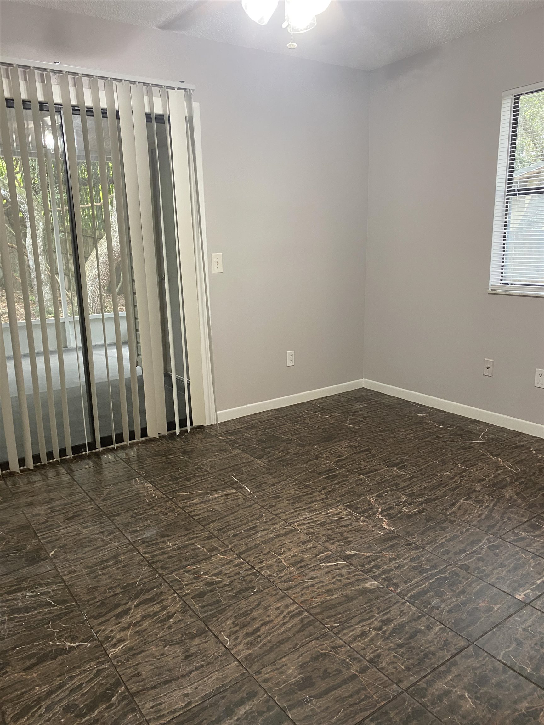 35 Atlantic Oaks Circle, Unit A St. Augustine Beach, FL 32080 - Photo 12 of 21 an empty room with windows