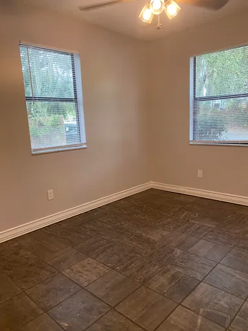 a view of a room with a large window