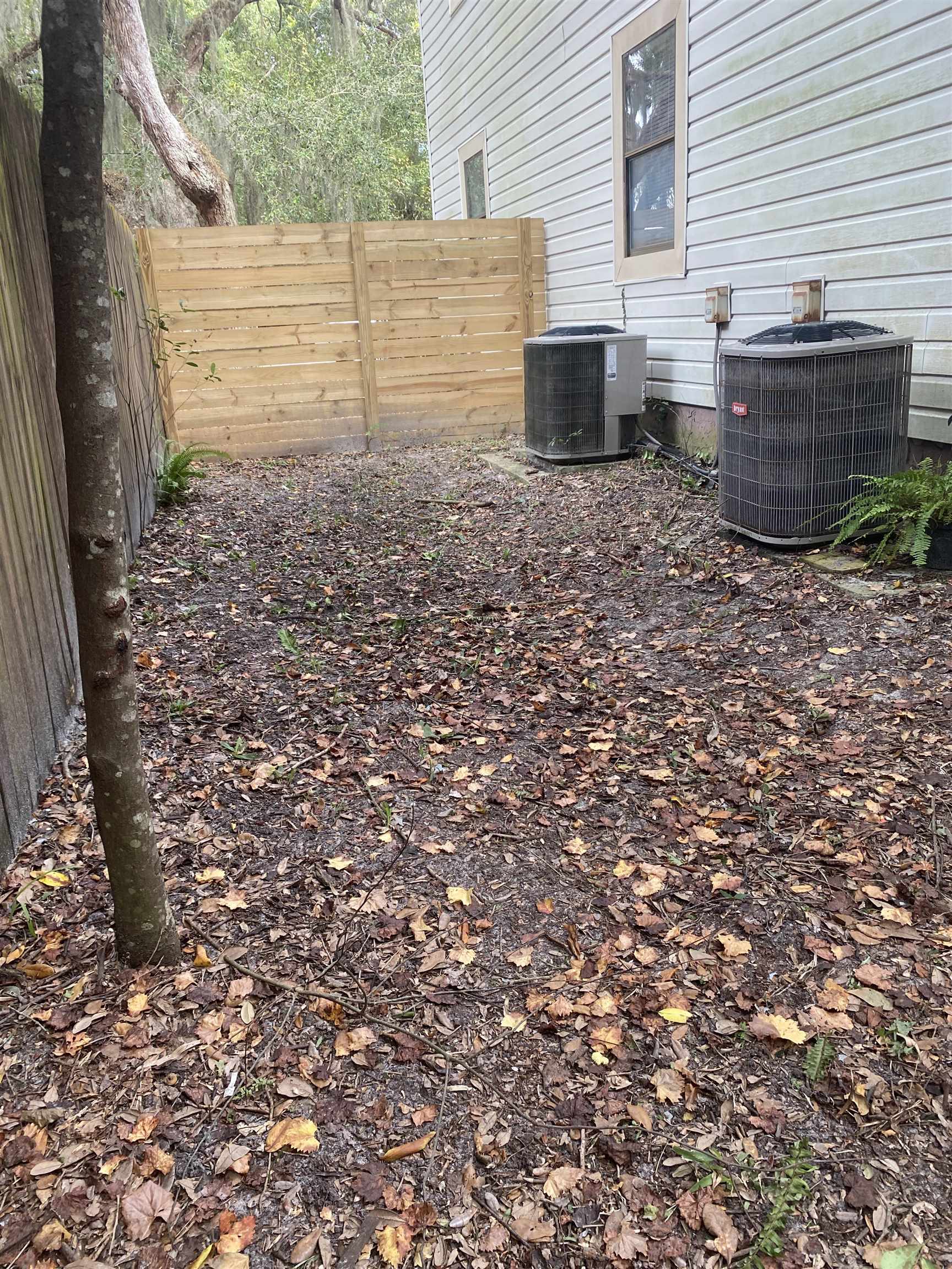 35 Atlantic Oaks Circle, Unit A St. Augustine Beach, FL 32080 - Photo 20 of 21 a backyard of a house