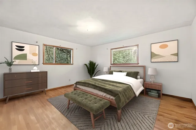 a bedroom with a bed and a dresser