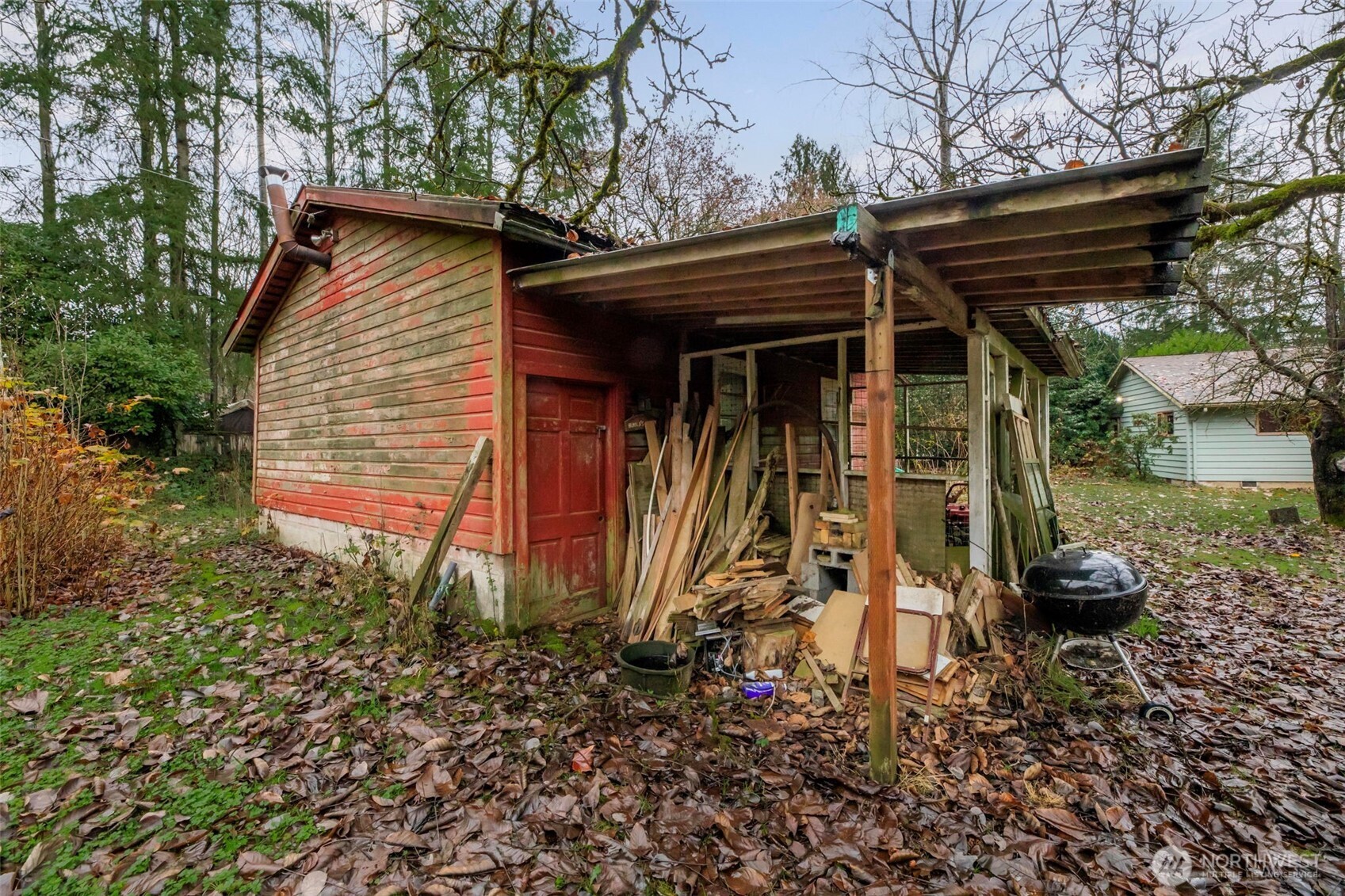 23827 Sofie Road Monroe, WA 98272 - Photo 25 of 35 a view of a house with a small yard and a patio