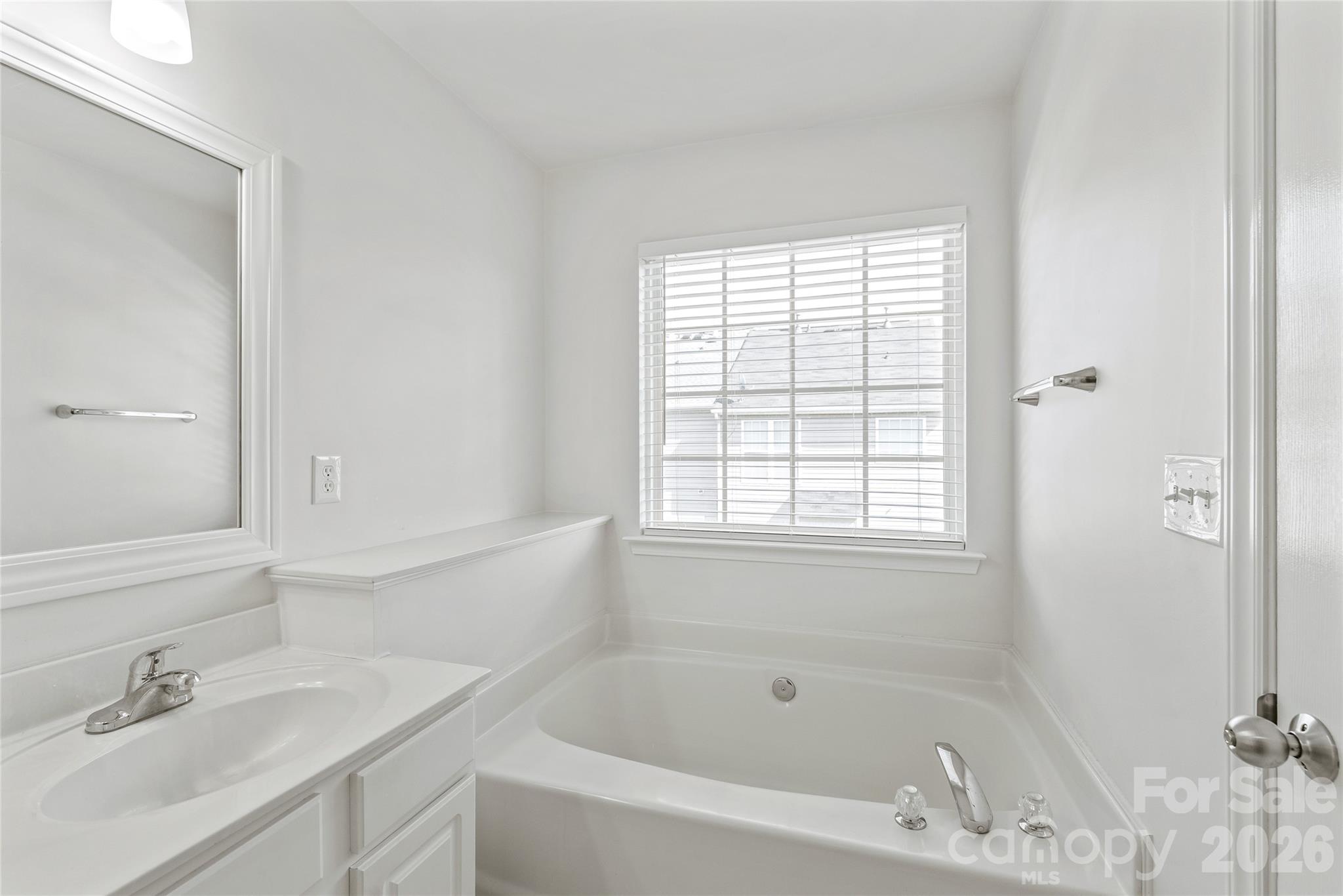 1707 Kashmir White Lane Fort Mill, SC 29708 - Photo 25 of 33 a white bath tub sitting next to a white sink