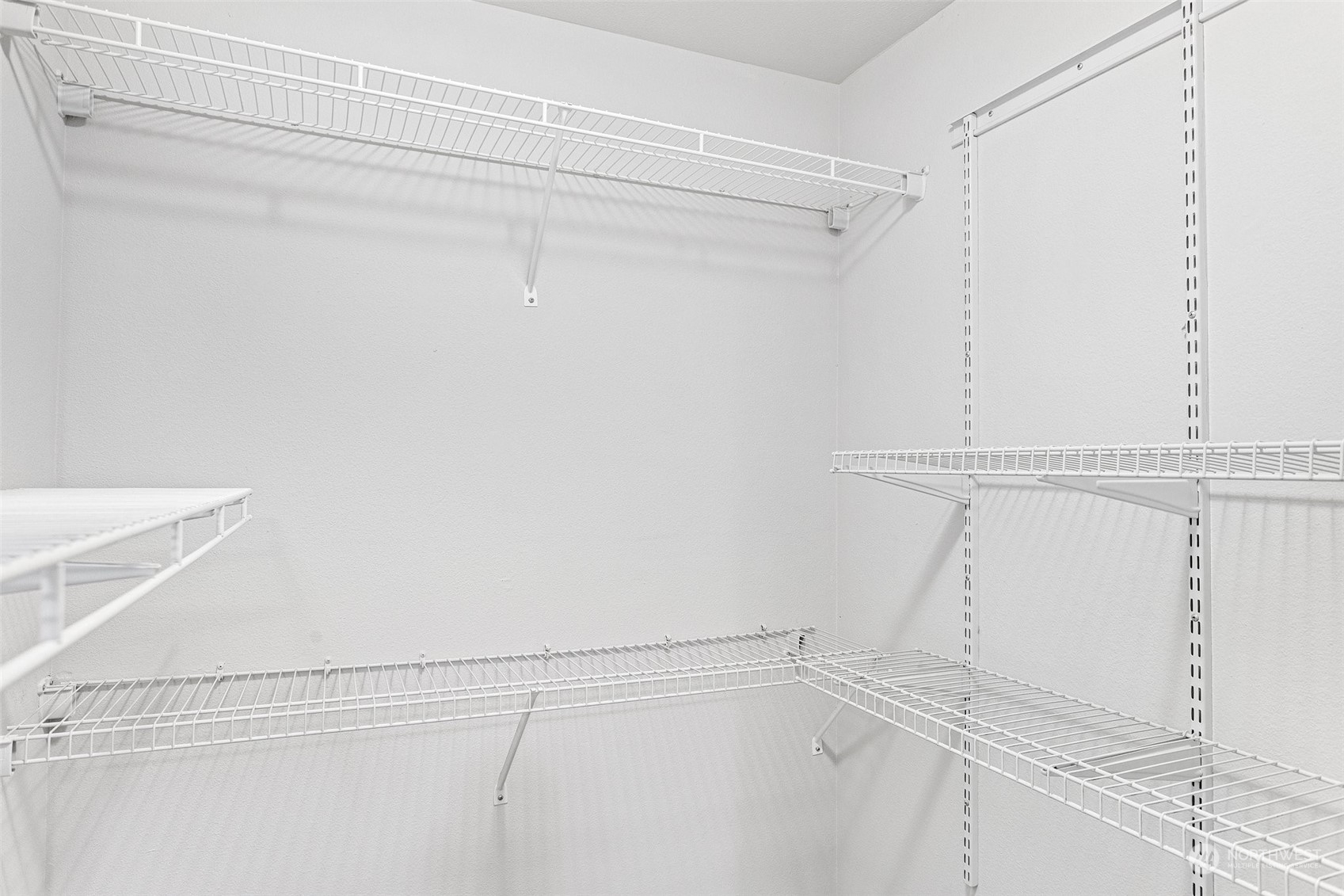 18930 Bothell Everett Highway, Unit L102 Bothell, WA 98012 - Photo 23 of 28 a view of walk in closet