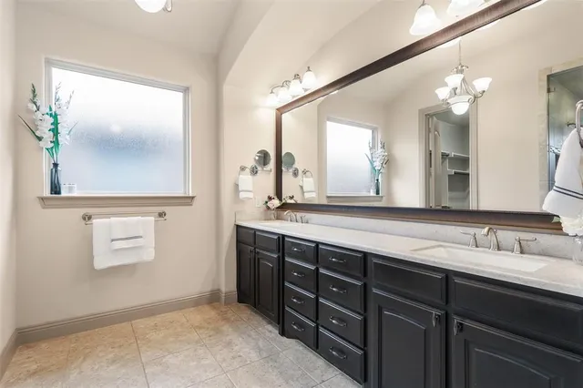 a front view of a house with many windows