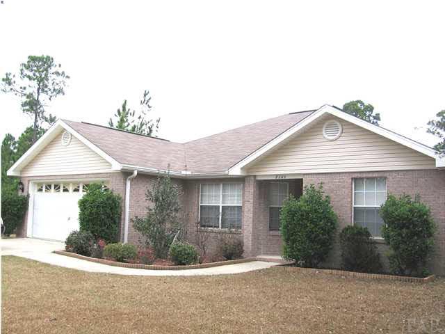 7346 Treasure Street Navarre, FL 32566 - Photo 8 of 14 Exceptional 3 br/2 ba/2 car garage home located next to GREEN BELT for peaceful, yet convenient location.