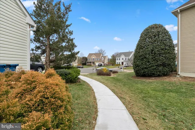 a view of a garden with a houses