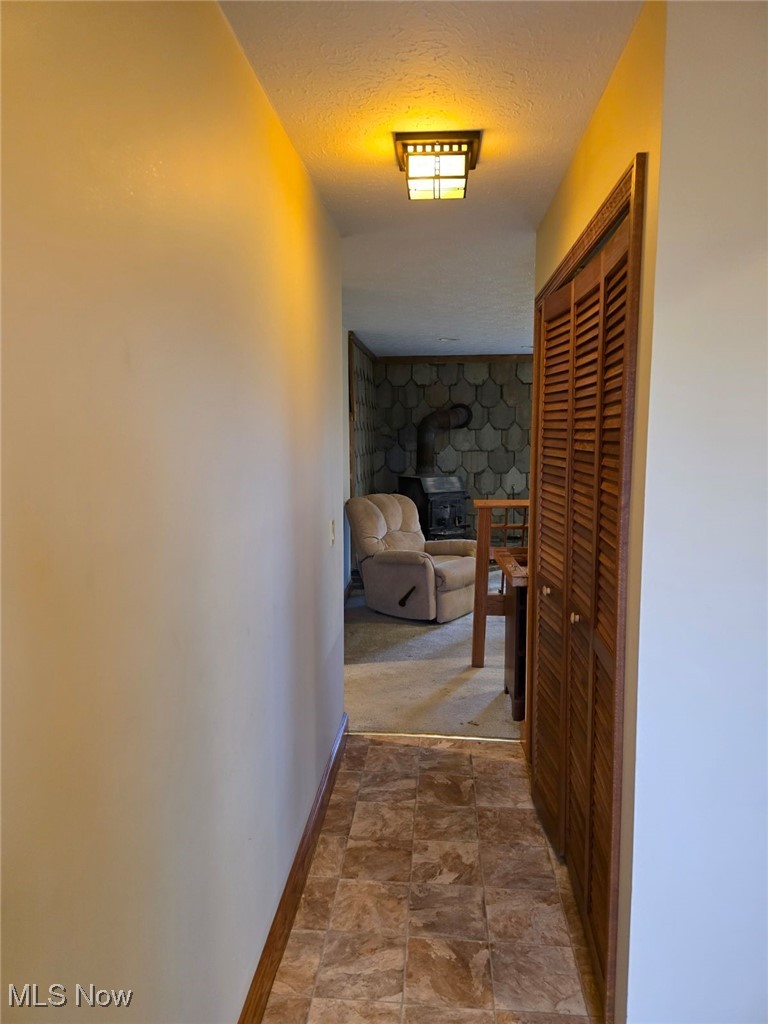 2490 Station Road Medina, OH 44256 - Photo 9 of 21 Corridor featuring a textured ceiling