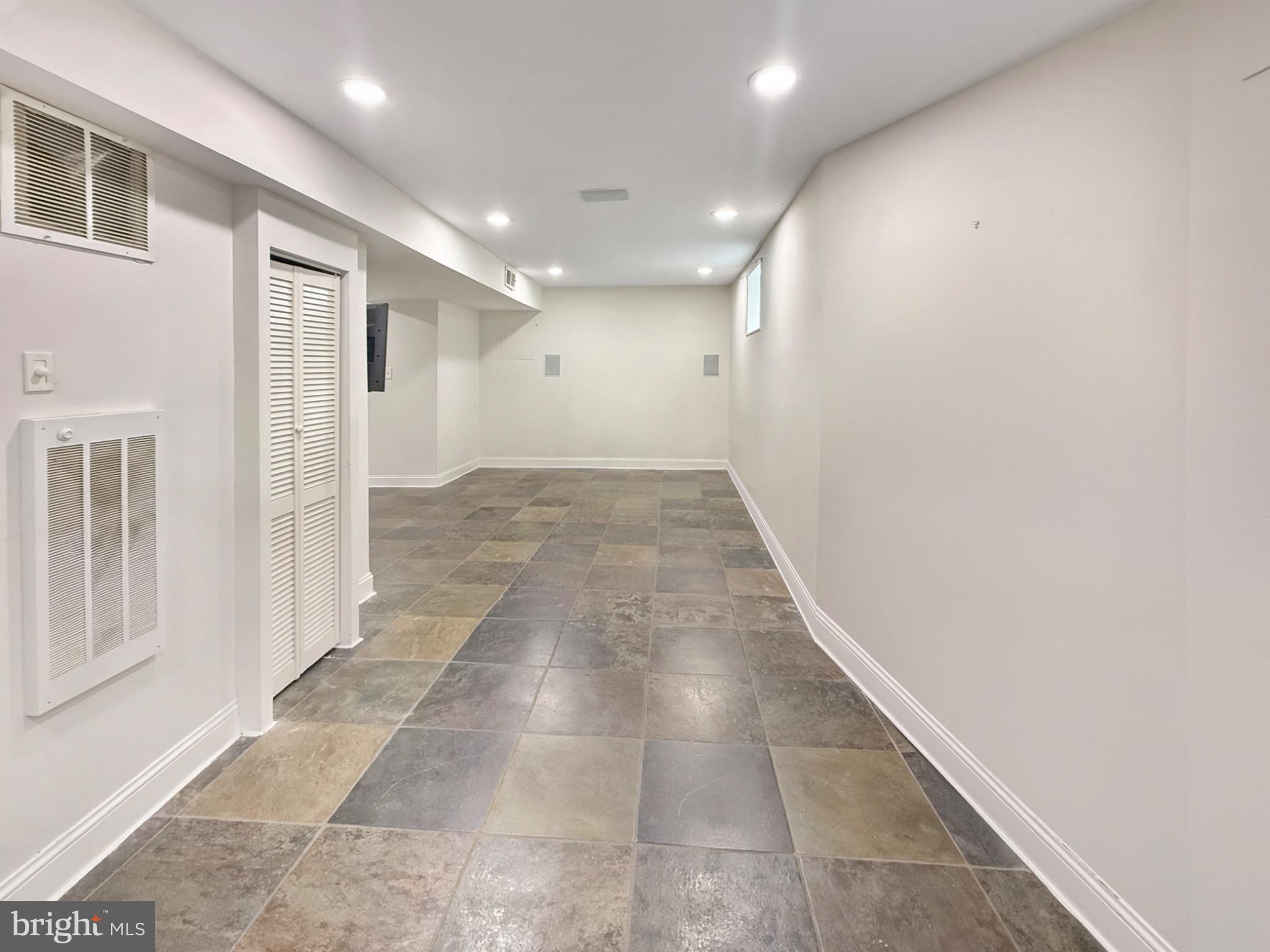 3216 18th Street Northeast Washington, DC 20018 - Photo 43 of 47 Spacious, versatile basement retreat.