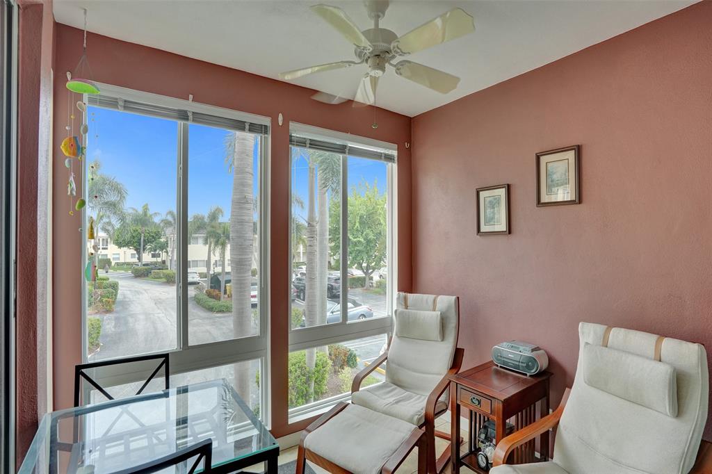 32 Colonial Club Drive, Unit 202 Boynton Beach, FL 33435 - Photo 19 of 38 a view of a livingroom with furniture and a window