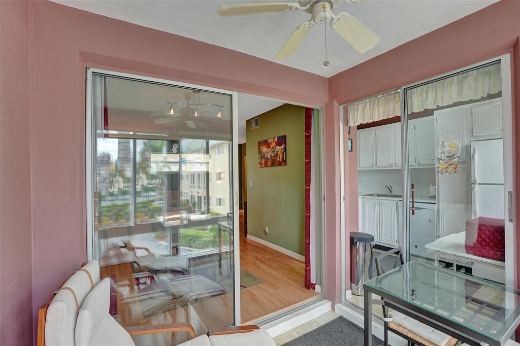 32 Colonial Club Drive, Unit 202 Boynton Beach, FL 33435 - Photo 21 of 38 a living room with furniture