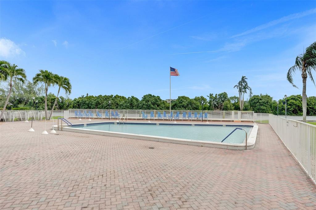 32 Colonial Club Drive, Unit 202 Boynton Beach, FL 33435 - Photo 32 of 38 a view of a lake and outdoor space
