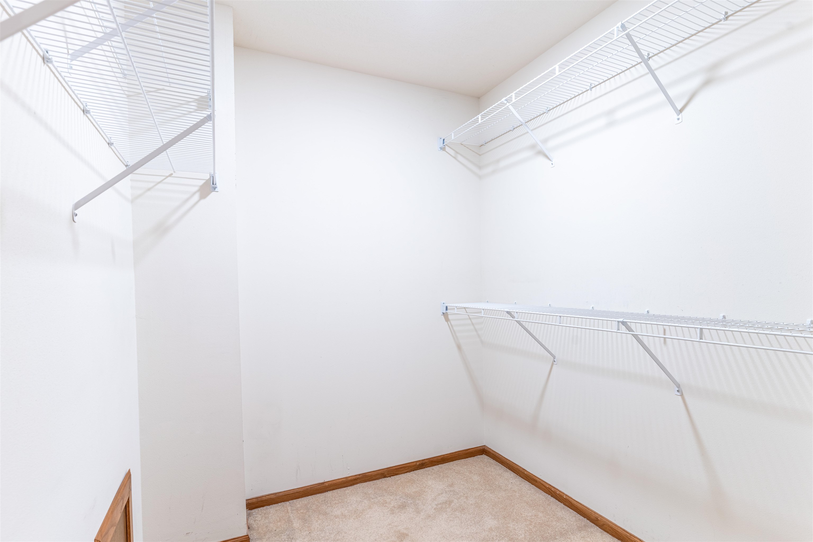 5269 Windsor Road Loves Park, IL 61111 - Photo 20 of 32 a view of a room with racks on the wall