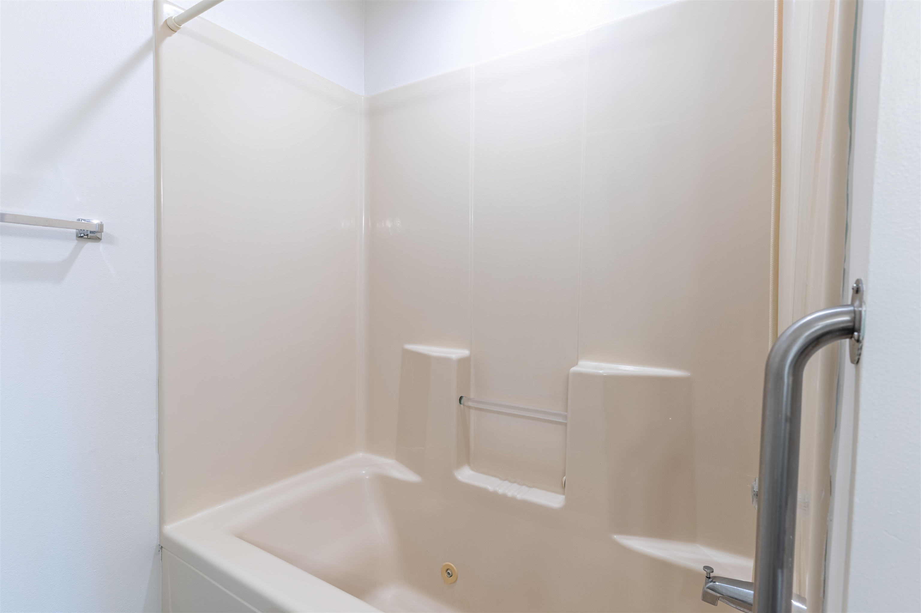 5269 Windsor Road Loves Park, IL 61111 - Photo 21 of 32 a bathroom with a white bath tub and a shower