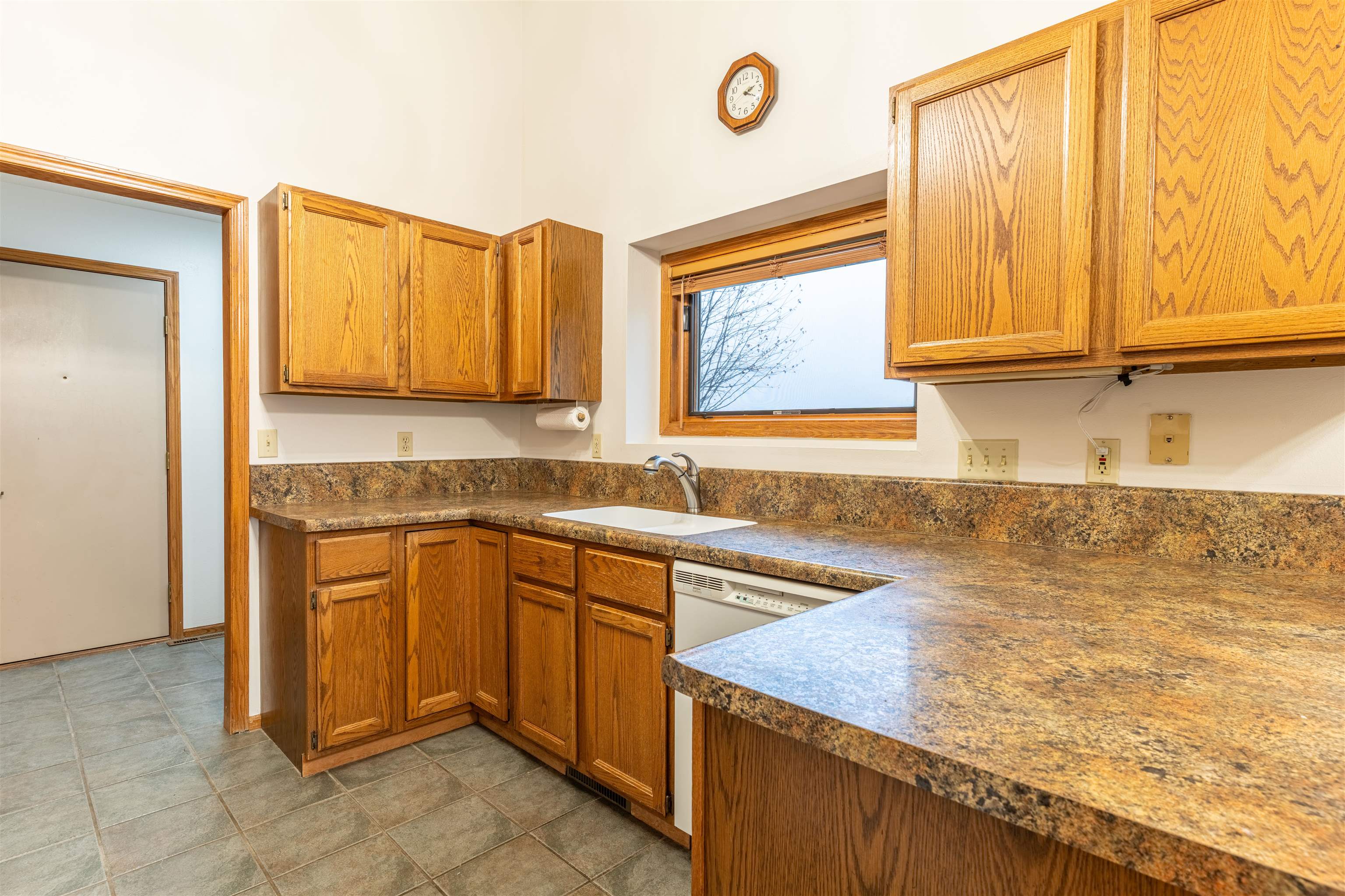 5269 Windsor Road Loves Park, IL 61111 - Photo 24 of 32 a kitchen with stainless steel appliances granite countertop a sink and a microwave