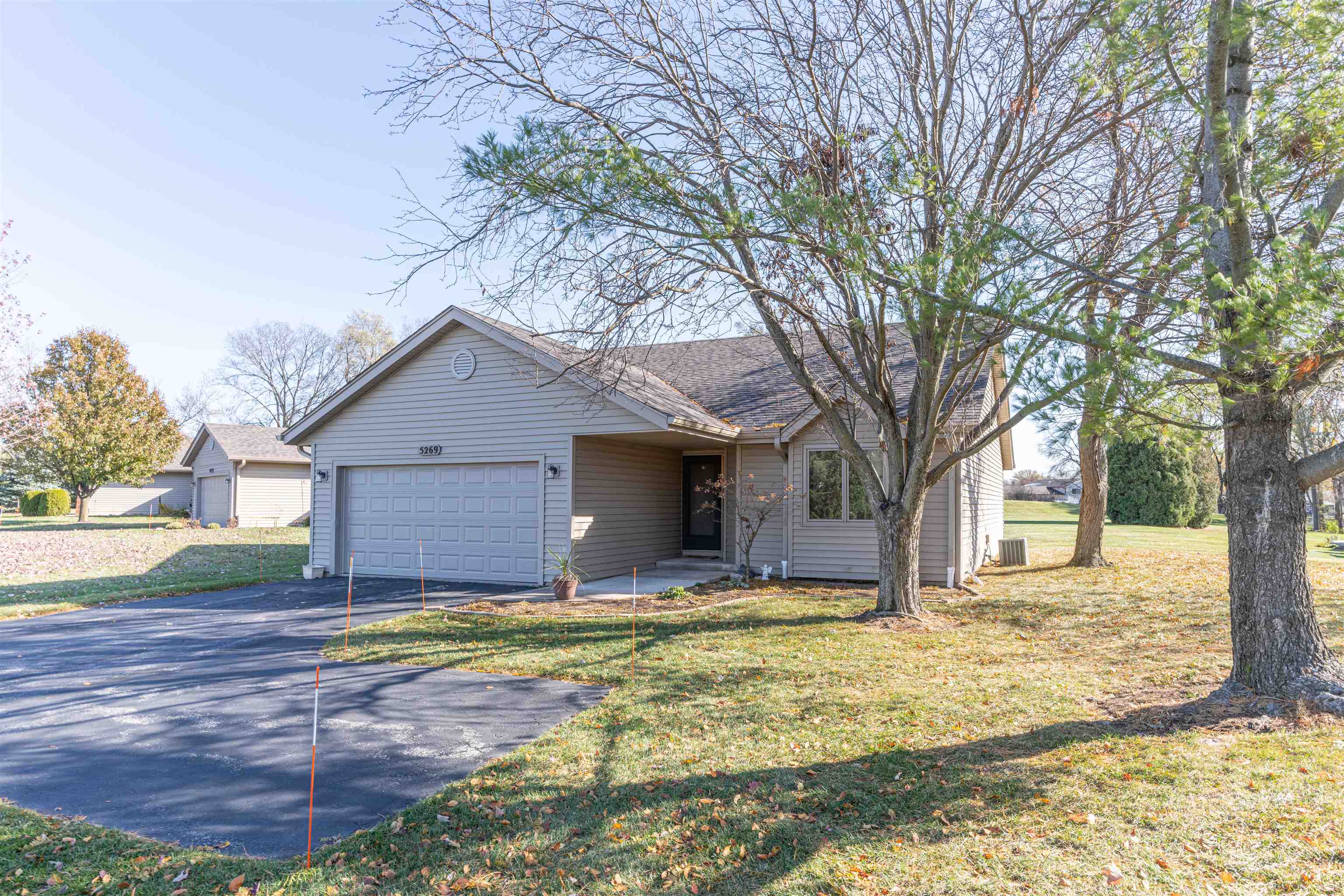 5269 Windsor Road Loves Park, IL 61111 - Photo 29 of 32 a house that has yard in front of it