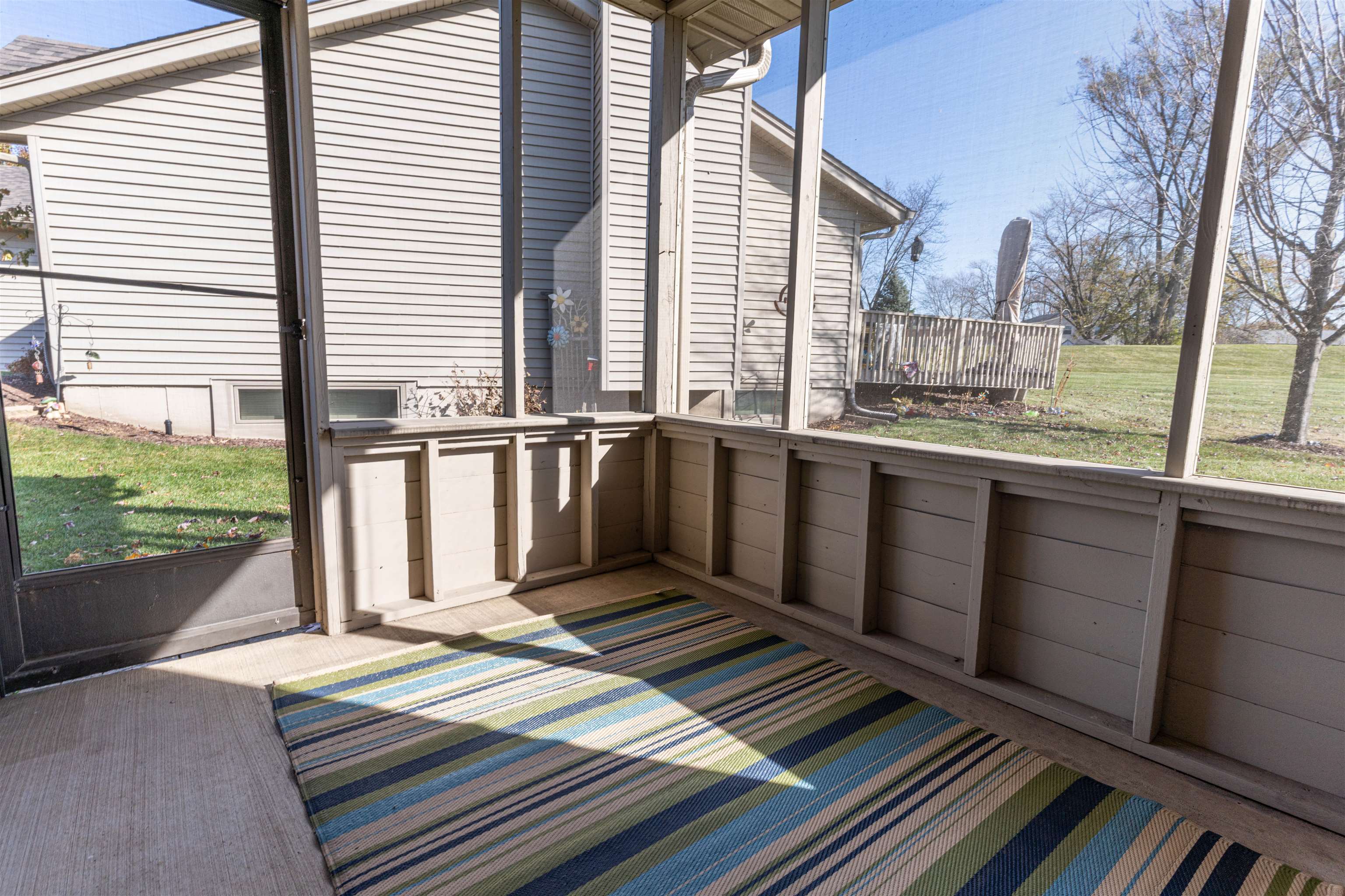 5269 Windsor Road Loves Park, IL 61111 - Photo 9 of 32 a view of a two chairs in the balcony