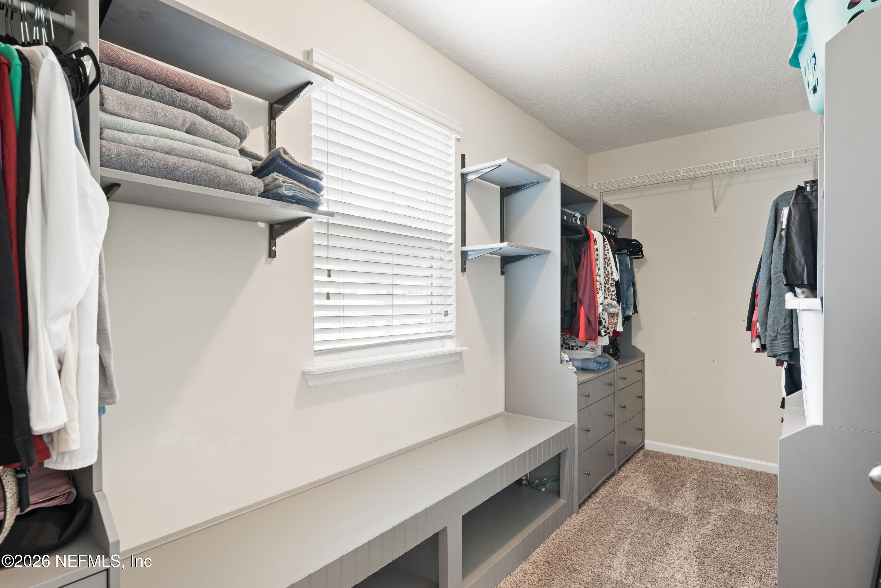 111 Paradas Place St. Augustine, FL 32092 - Photo 29 of 46 a view of walk in closet with clothes and shoes