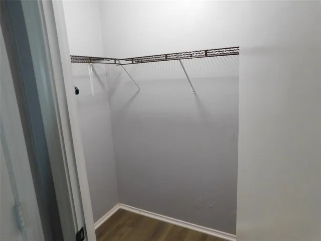 a view of small space with racks on the wall