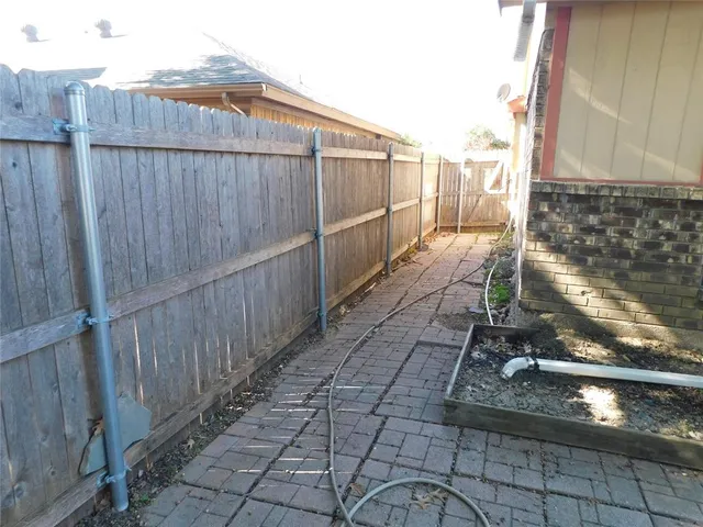 a view of a wooden fence