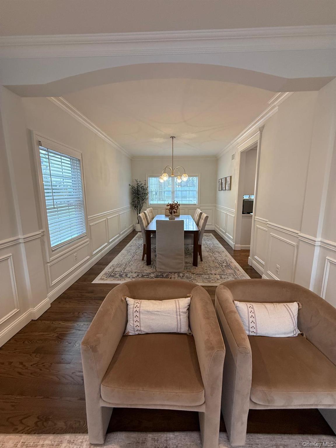 116 Winifred Drive Merrick, NY 11566 - Photo 15 of 40 a view of a dining room with furniture window and wooden floor