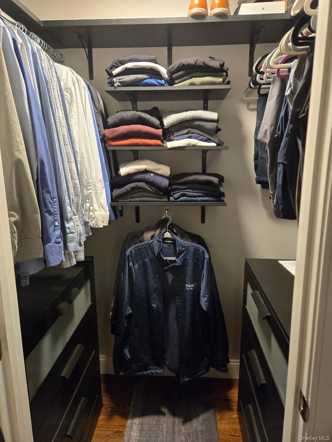 116 Winifred Drive Merrick, NY 11566 - Photo 23 of 40 a view of walk in closet with clothes and shoes