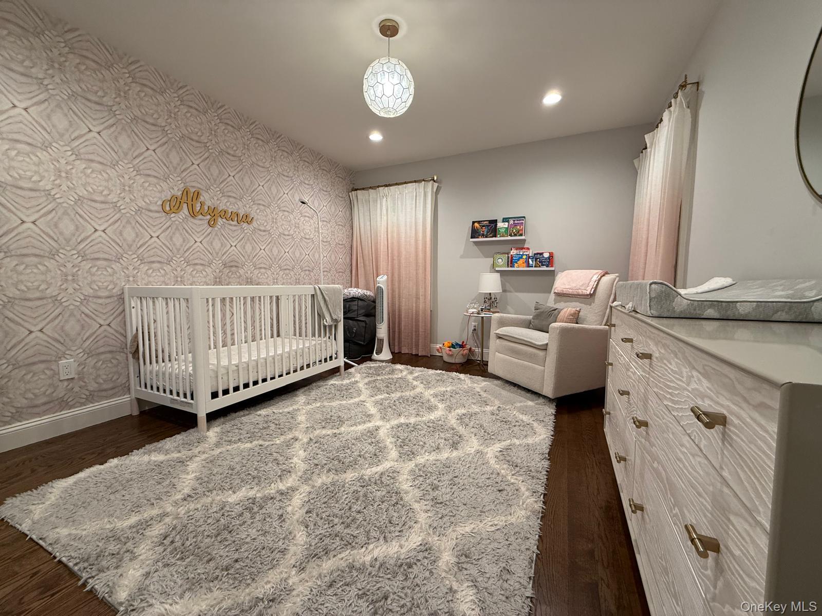 116 Winifred Drive Merrick, NY 11566 - Photo 33 of 40 a living room with furniture and a window