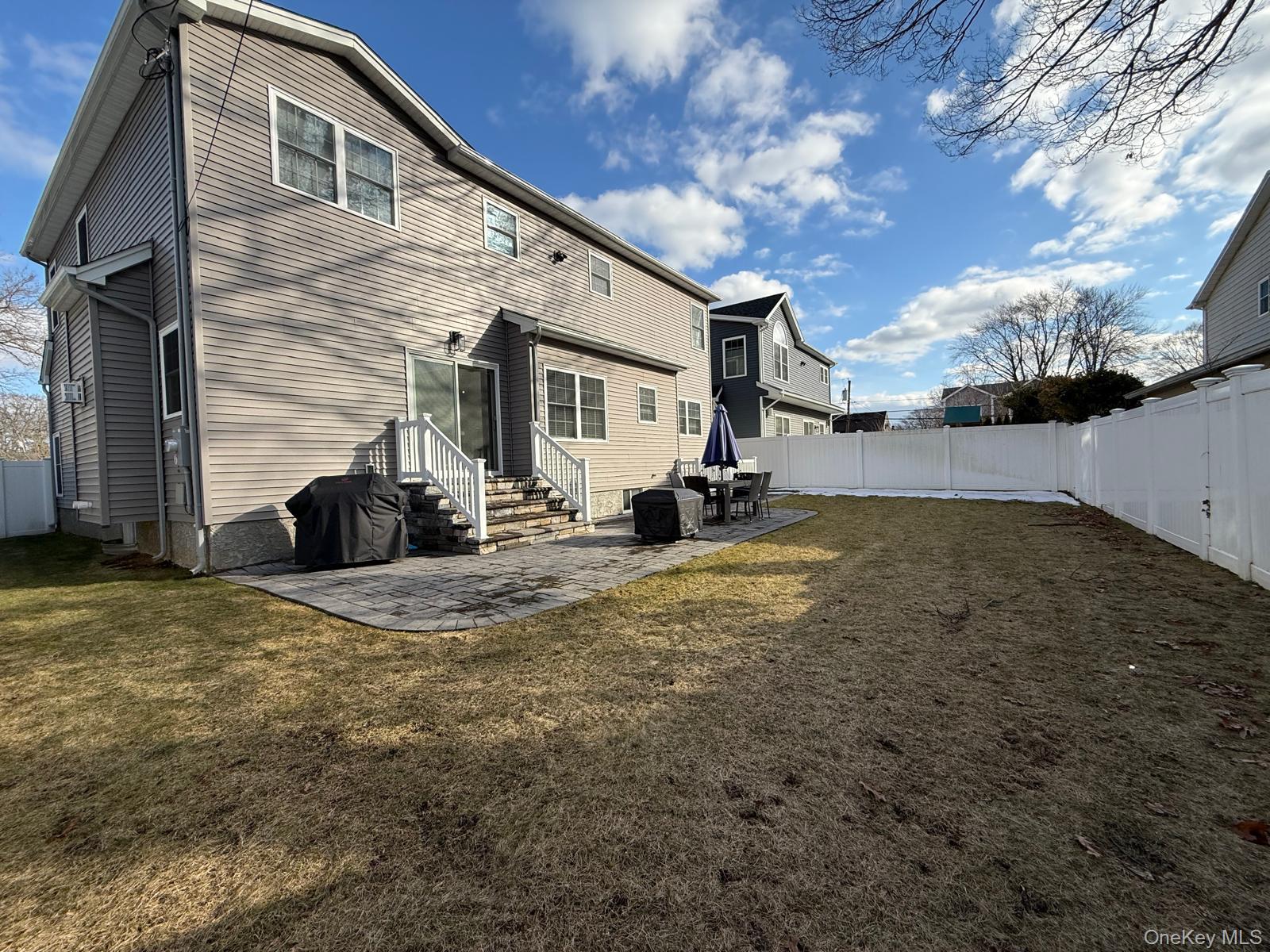 116 Winifred Drive Merrick, NY 11566 - Photo 38 of 40 a view of a house with a yard