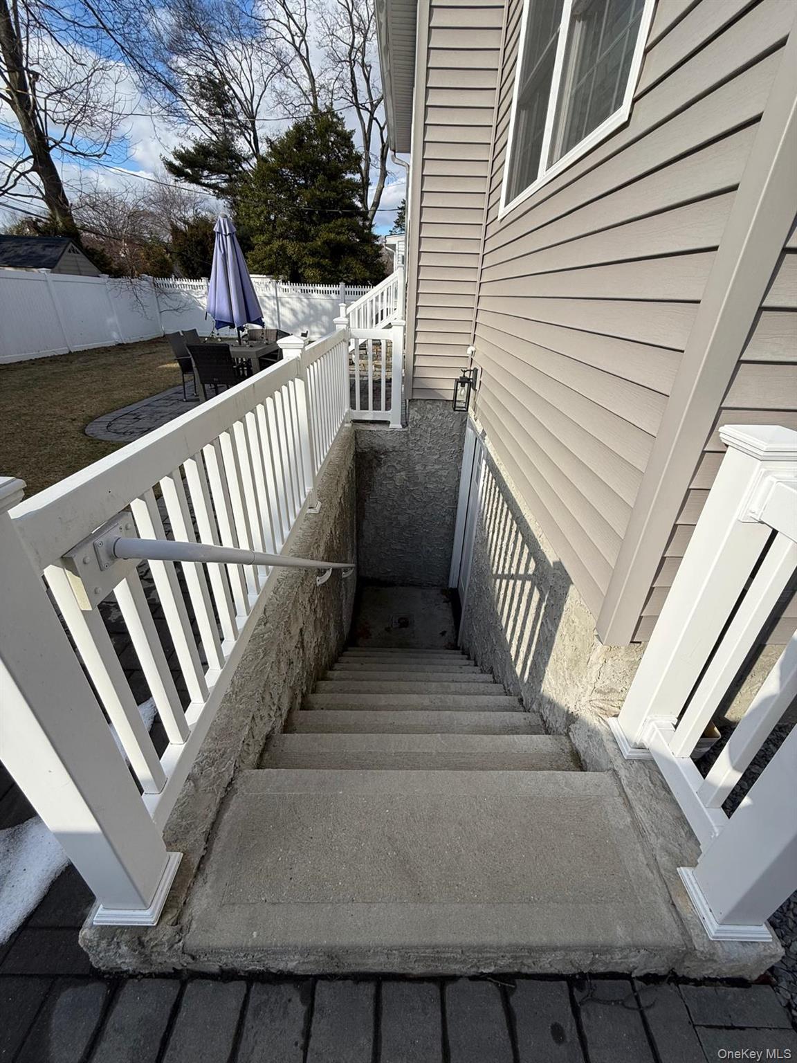 116 Winifred Drive Merrick, NY 11566 - Photo 40 of 40 a view of a balcony with stairs
