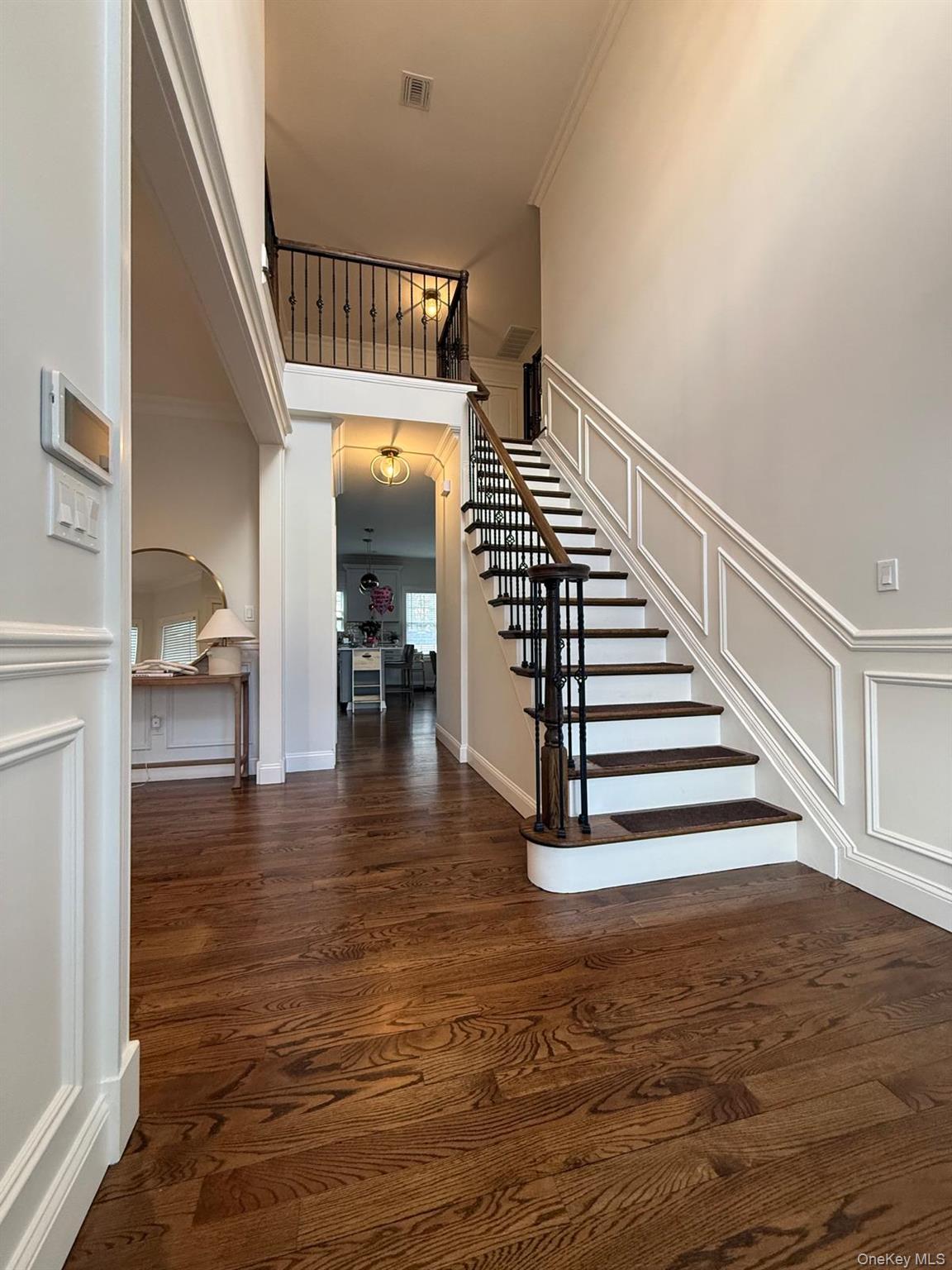 116 Winifred Drive Merrick, NY 11566 - Photo 4 of 40 a view of entryway and hall with wooden floor