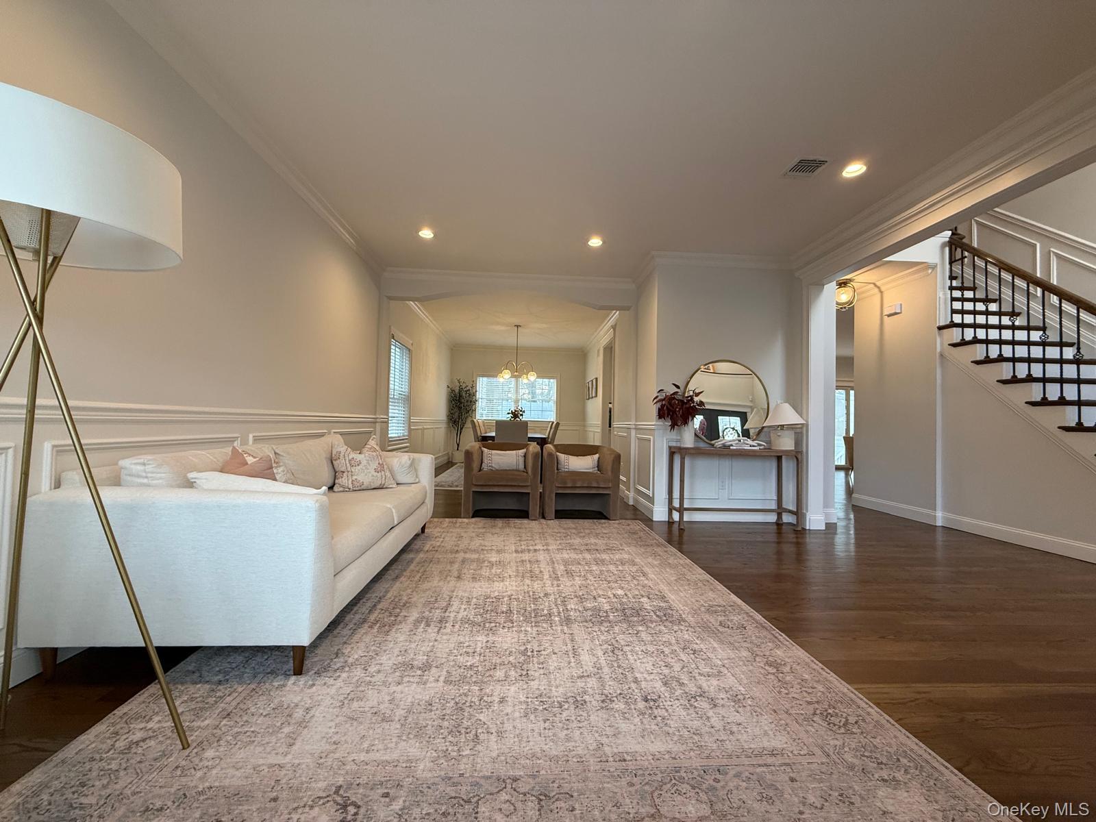 116 Winifred Drive Merrick, NY 11566 - Photo 5 of 40 a living room with furniture and a table