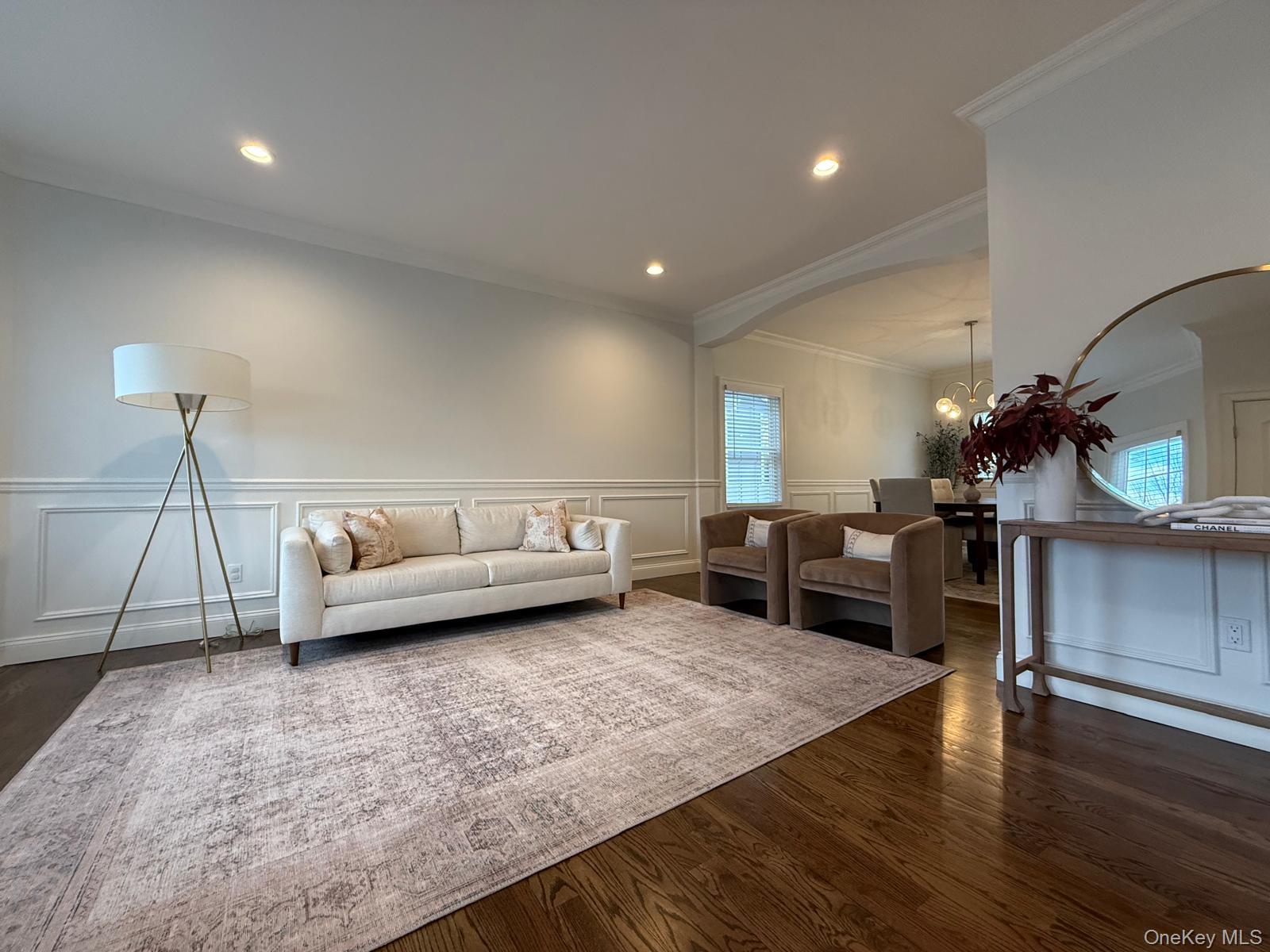 116 Winifred Drive Merrick, NY 11566 - Photo 6 of 40 a living room with furniture and a wooden floor
