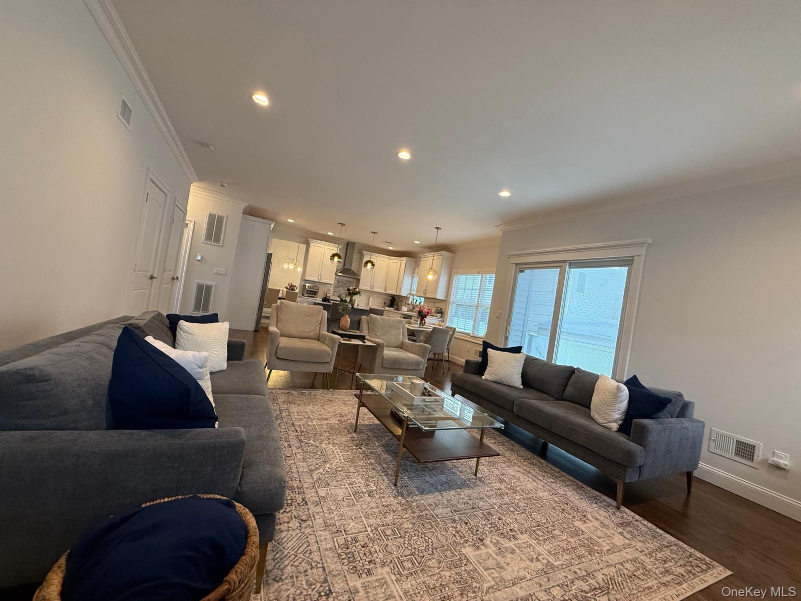 116 Winifred Drive Merrick, NY 11566 - Photo 9 of 40 a living room with furniture and a rug