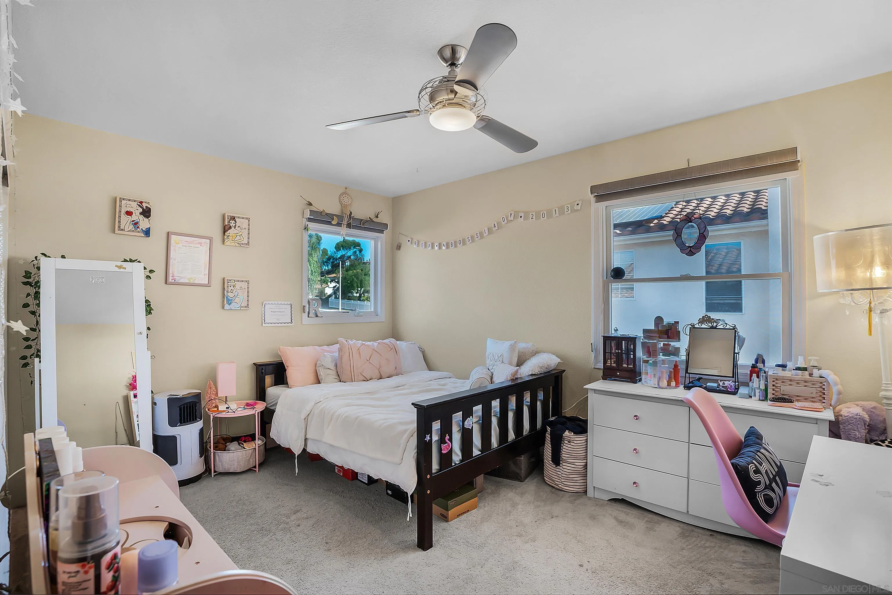 2653 Sausalito Avenue Carlsbad, CA 92010 - Photo 24 of 30 a bedroom with a bed and a table
