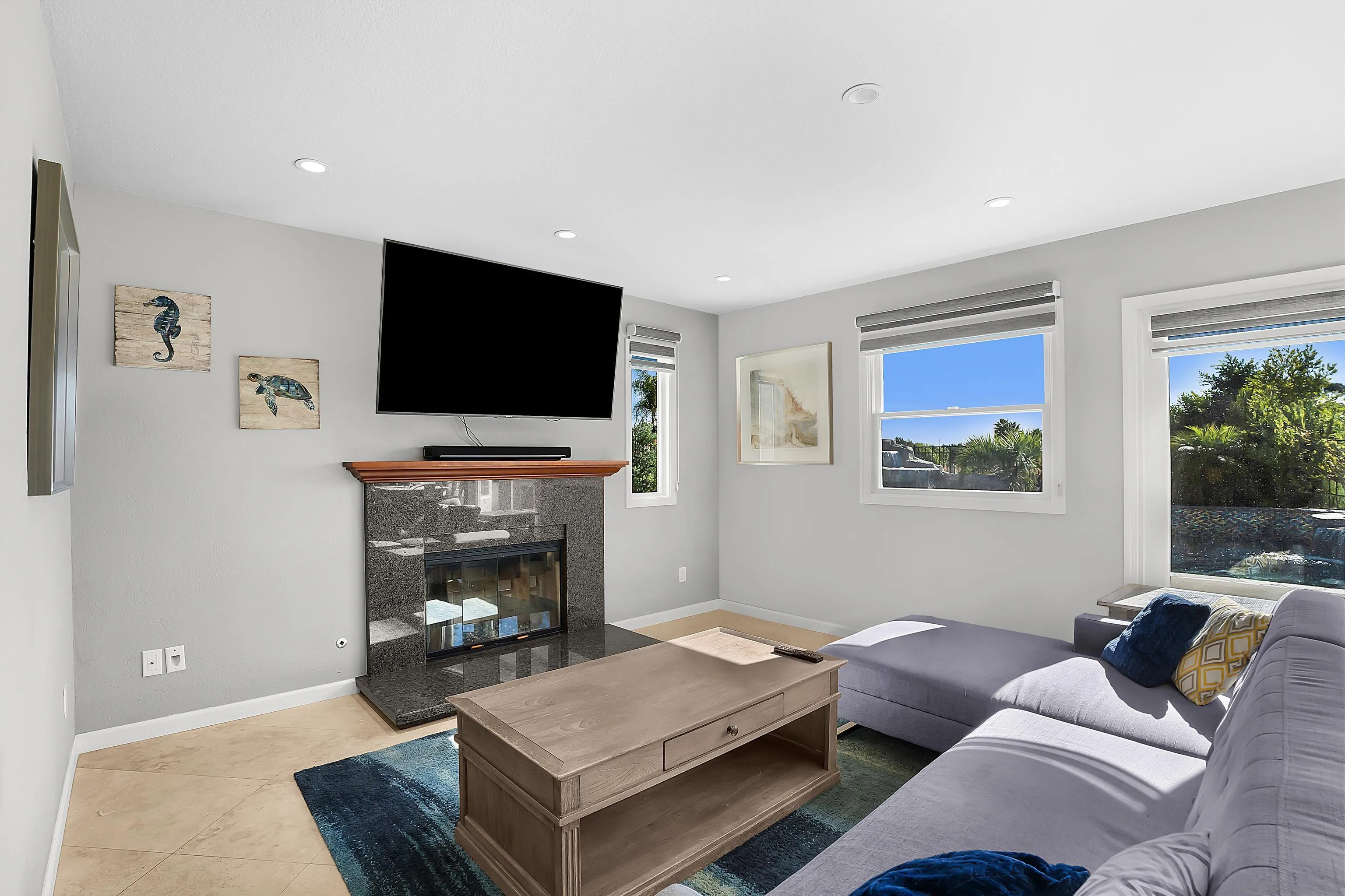 2653 Sausalito Avenue Carlsbad, CA 92010 - Photo 7 of 30 a living room with furniture and a flat screen tv