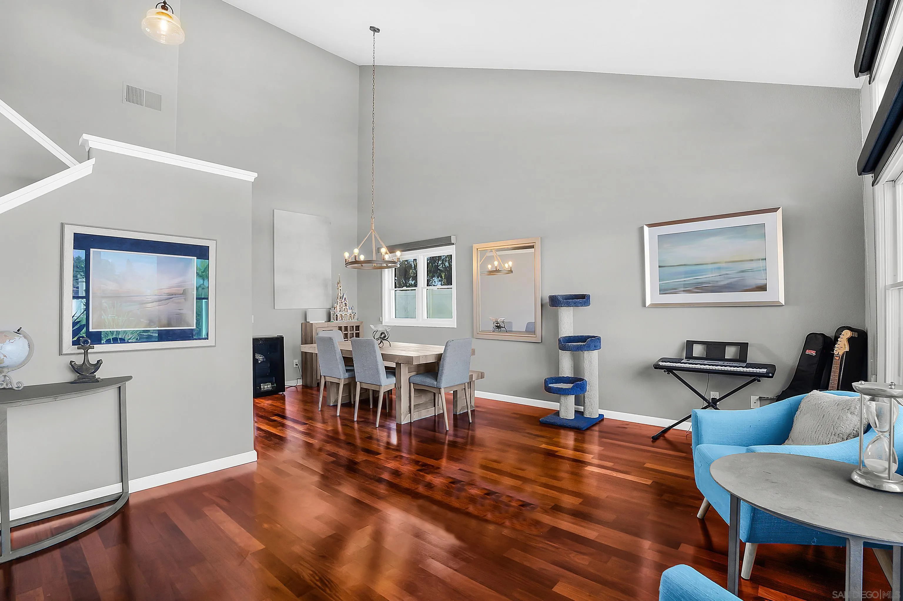 2653 Sausalito Avenue Carlsbad, CA 92010 - Photo 8 of 30 a living room with furniture and a wooden floor