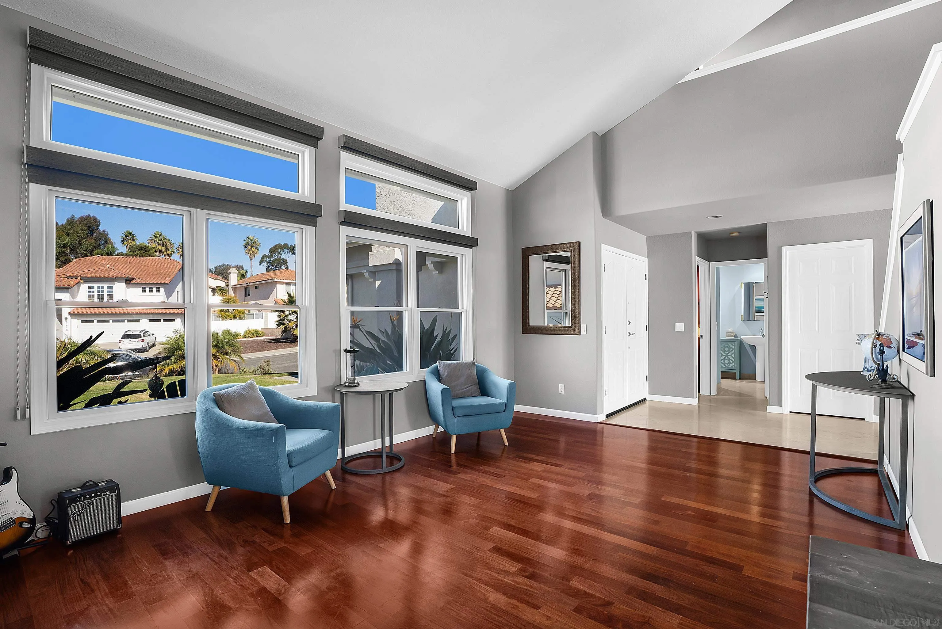 2653 Sausalito Avenue Carlsbad, CA 92010 - Photo 9 of 30 a living room with furniture and a painting on the wall