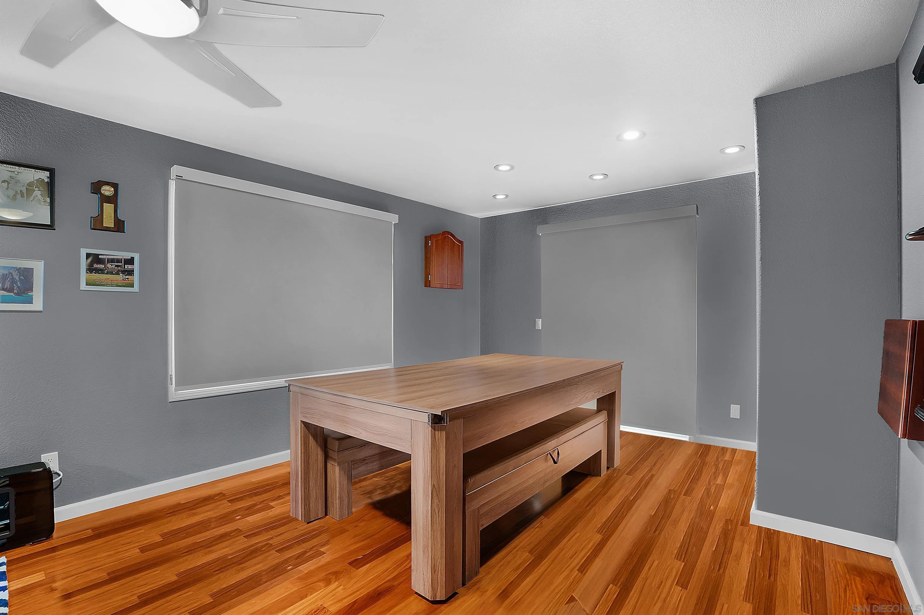 2653 Sausalito Avenue Carlsbad, CA 92010 - Photo 10 of 30 a room with wooden floor and storage