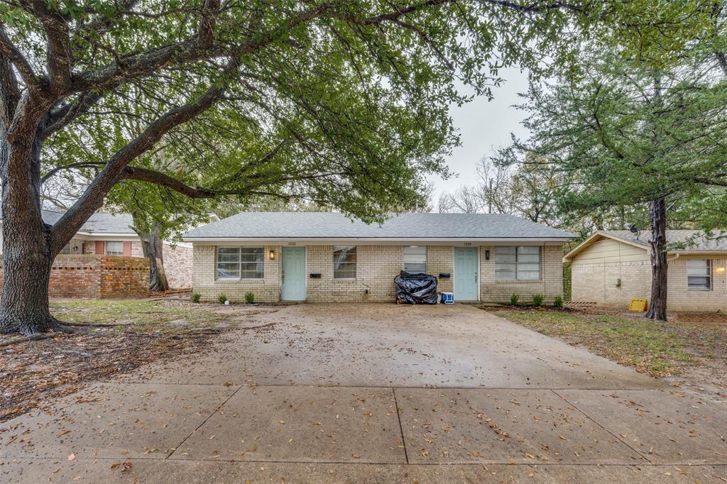 1222-1224 West Hunt Street, Unit 1222 Sherman, TX 75092 - Photo 1 of 23 a house with a outdoor space