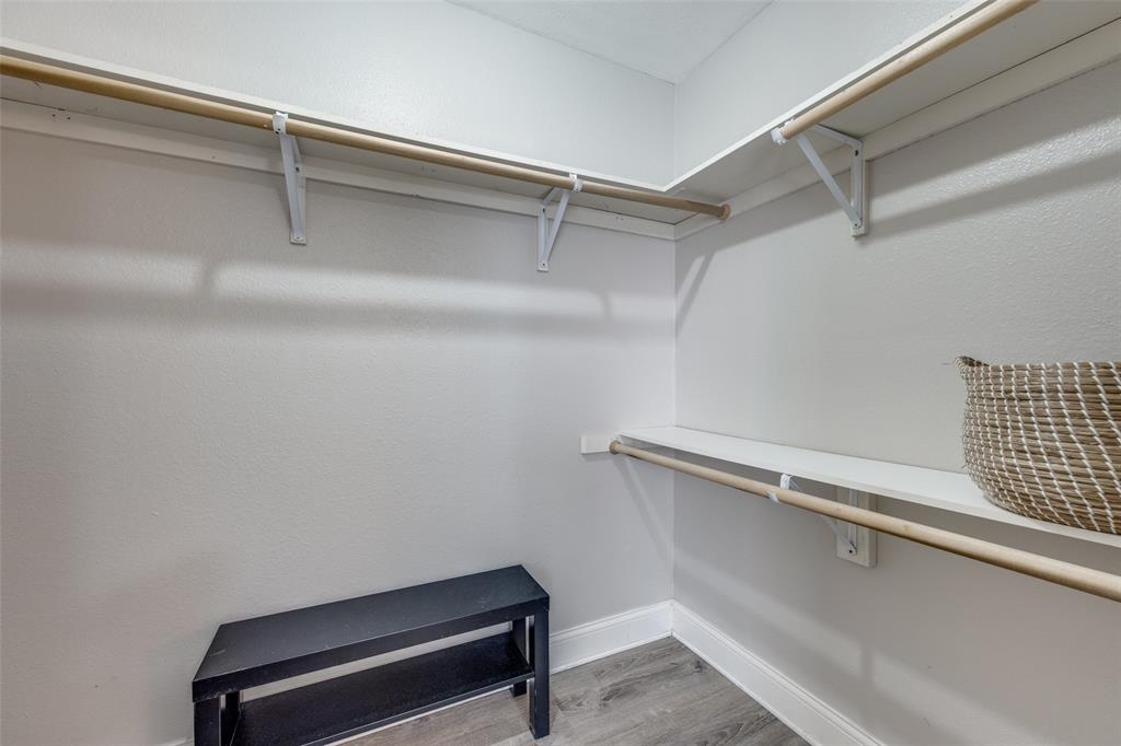 1222-1224 West Hunt Street, Unit 1222 Sherman, TX 75092 - Photo 20 of 23 a view of a room with racks on the wall