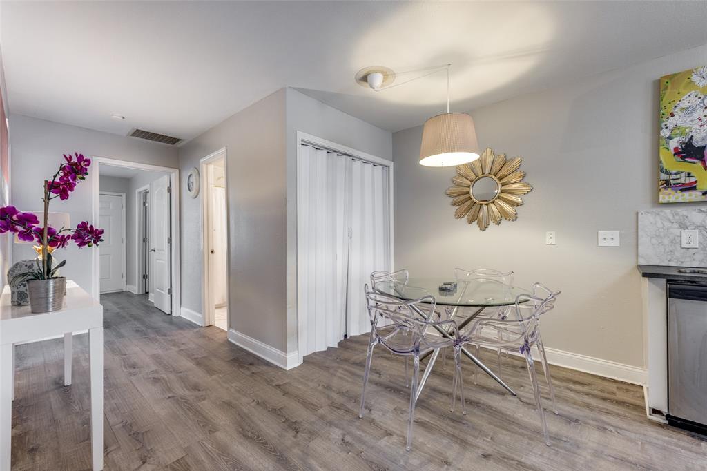 1222-1224 West Hunt Street, Unit 1222 Sherman, TX 75092 - Photo 9 of 23 a view of a dining room with furniture and wooden floor