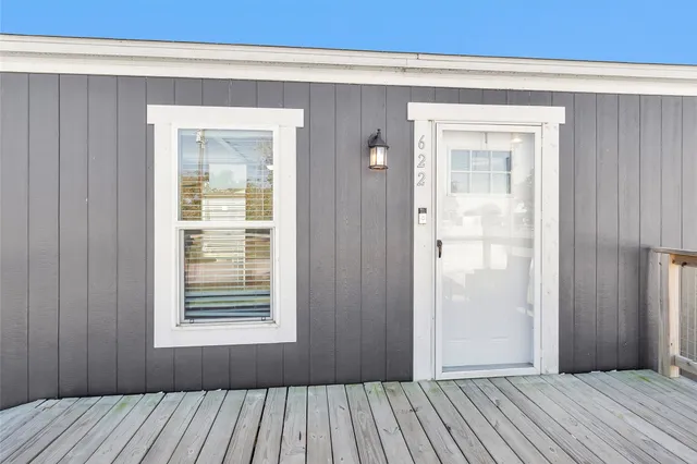 wooden floor and windows in a room