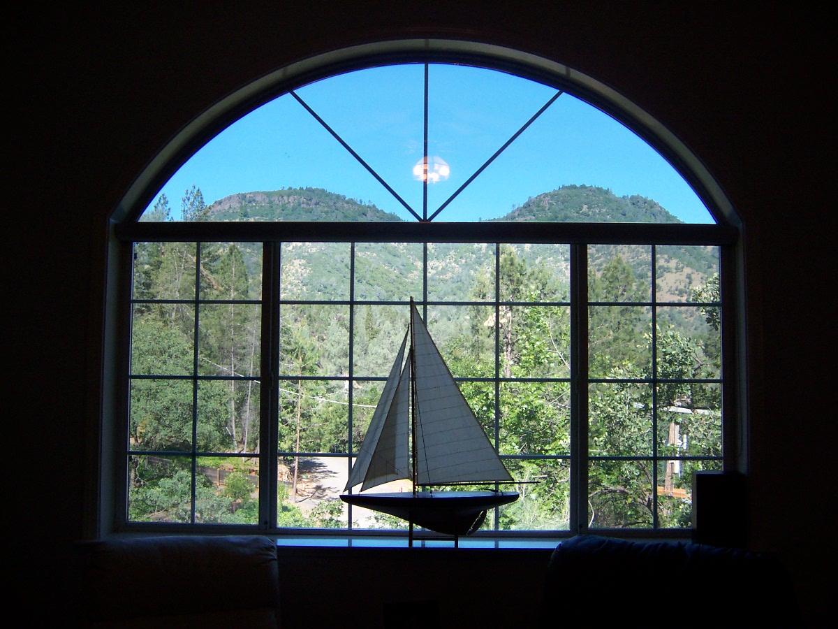 22211 Sunshine Way Redding, CA 96003 - Photo 2 of 2 a view of a porch in front of a house