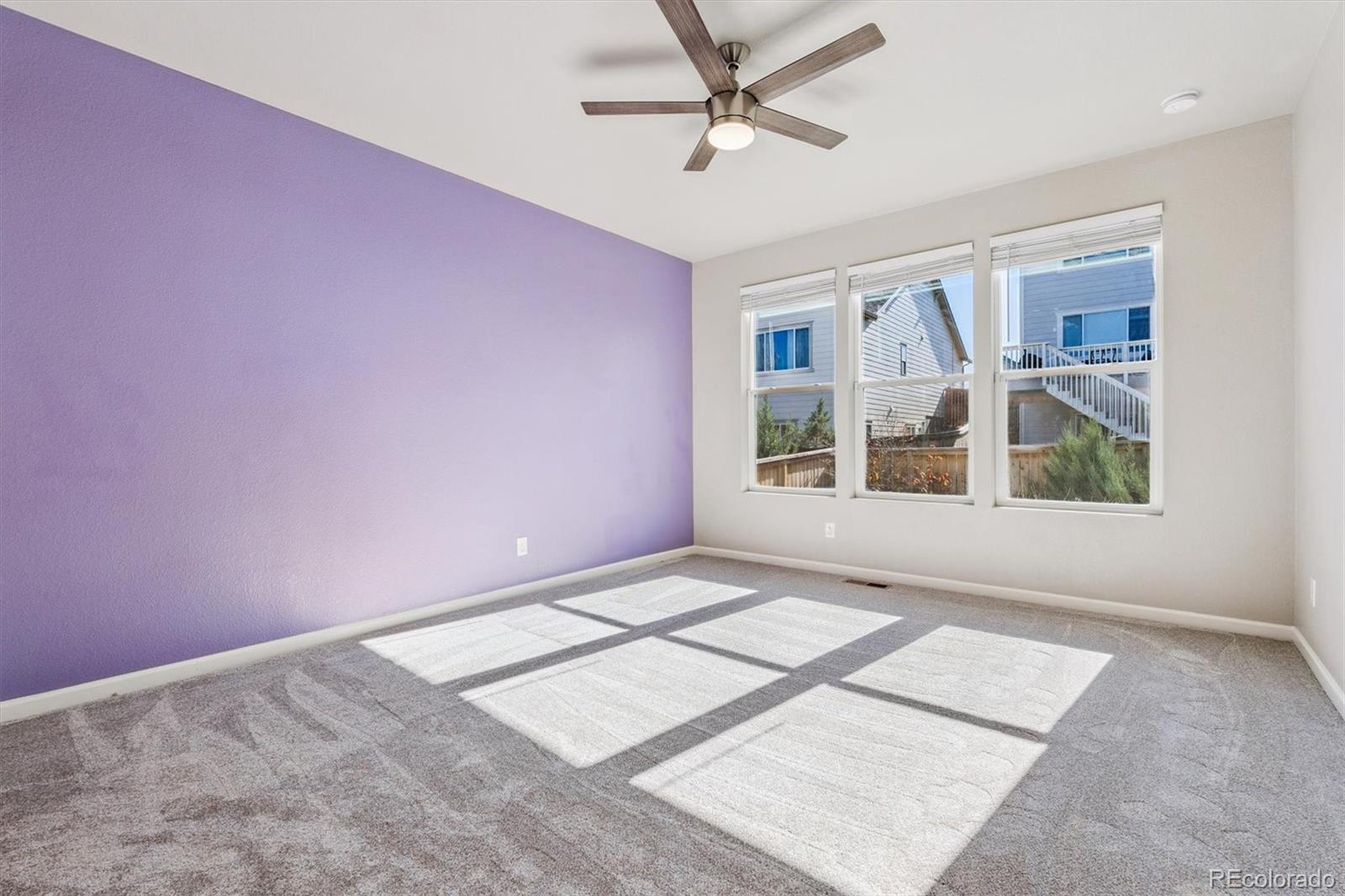 767 Wagon Bend Road Berthoud, CO 80513 - Photo 12 of 21 a view of an empty room with a window
