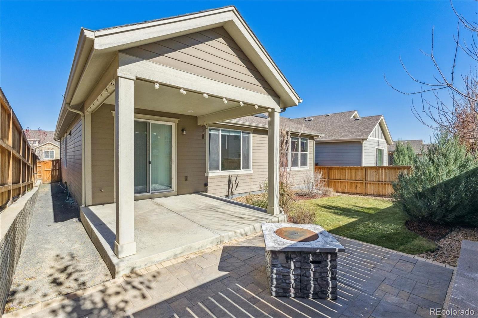 767 Wagon Bend Road Berthoud, CO 80513 - Photo 16 of 21 a view of a house with backyard and sitting area